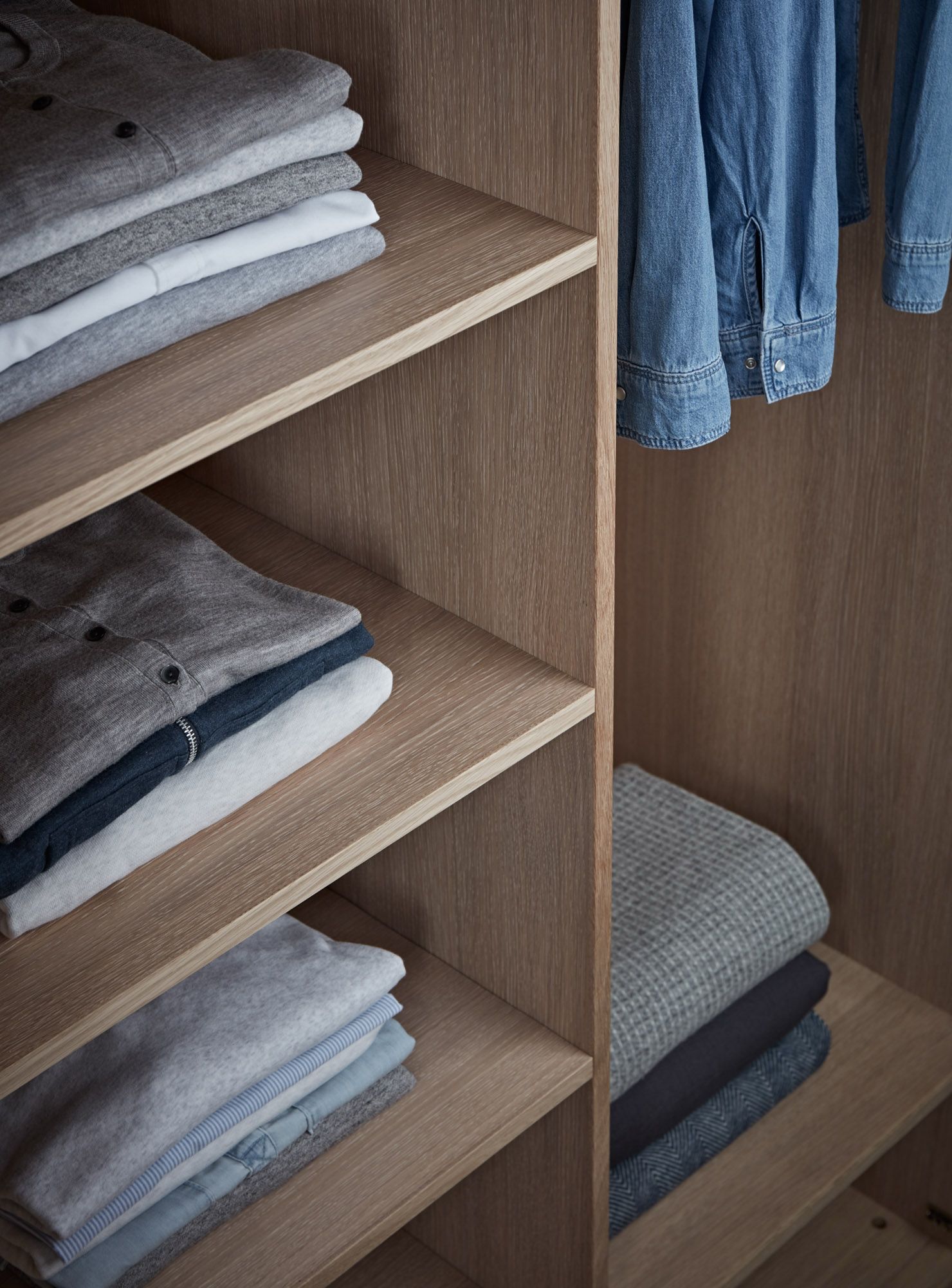 Oak wardrobe interior with shelving