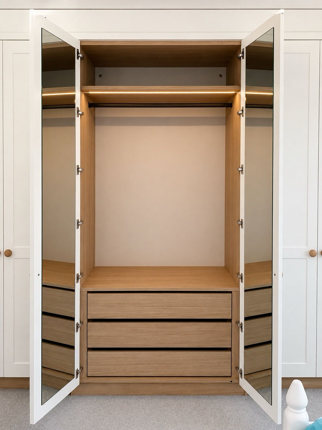 Wardrobe interior with oak drawers
